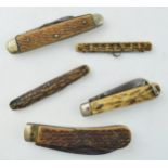 A collection of horn handled pocket knives to include single and double blade examples by