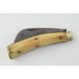 Saynor bone handled antique flatcap penknife, 10.5cm long, 17.5cm when unfolded.