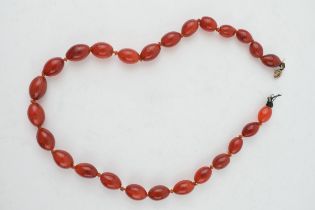 Carnelian or similar semi precious stone vintage necklace. Strung oval shaped stones. Weight 58