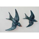 A pair of Beswick Swallow wall plaques to include 757-2 and 757-3 (2). In good condition with no