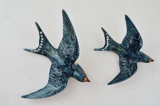 A pair of Beswick Swallow wall plaques to include 757-2 and 757-3 (2). In good condition with no