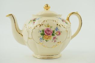 Sadler round large teapot decorated with roses, 23cm long. In good condition with no obvious