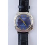 A gentleman's 'Alpen' De Luxe Swiss Made wristwatch. A blue circular dial with applied baton marker.