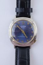 A gentleman's 'Alpen' De Luxe Swiss Made wristwatch. A blue circular dial with applied baton marker.