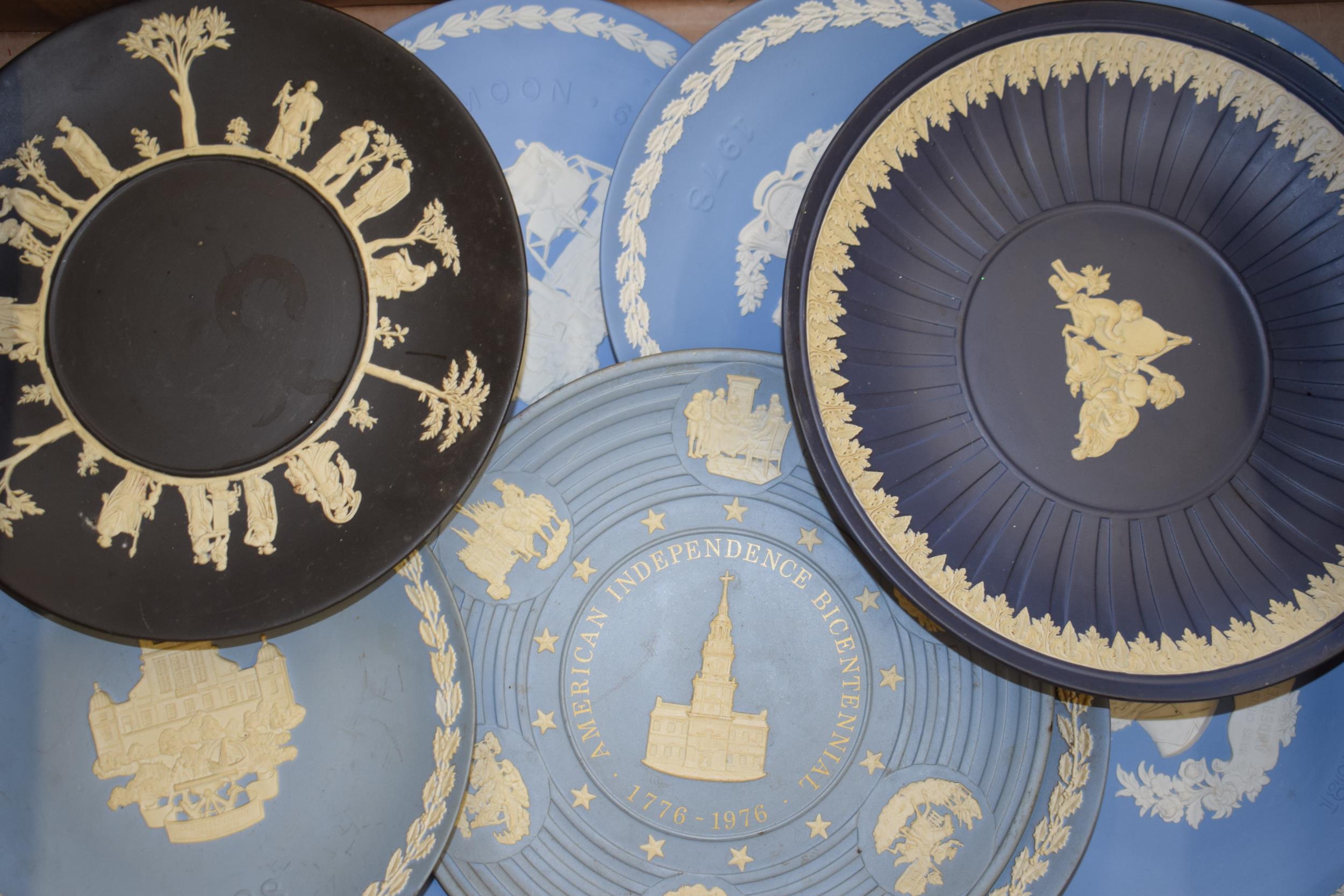 Wedgwood Jasperware plates in colours such as blue, cobalt blue and black in varying patterns and