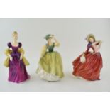 A collection of Royal Doulton figures to include 'Buttercup' HN 2309, 'Autumn Breezes' HN 934 and '