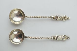 A pair of silver apostle salt spoons, Birm 1896, 8.7 grams.