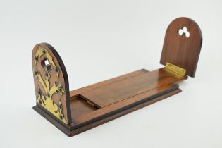 A 19th century book slide / self closing bookshelf. 34cm when closed. 47.5cm extended. Free of