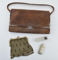A collection of items to include a crocodile skin purse, with silver clasps and mounts. A silver