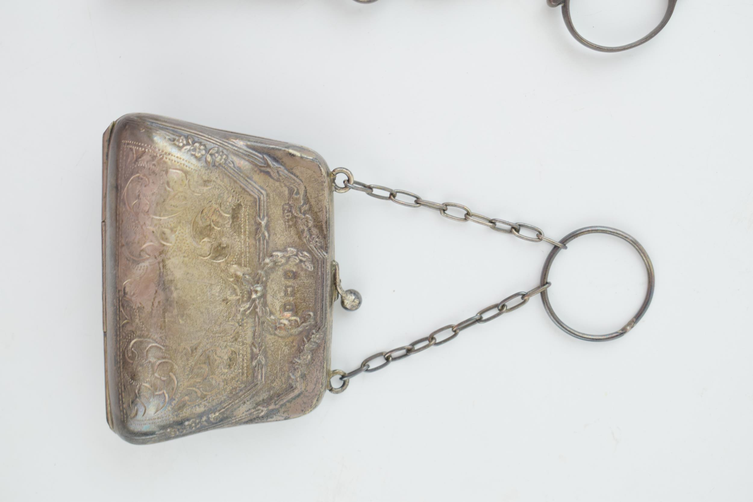 A pair of silver sugar nips, 36.2 grams, with a silver ladies purse with leather insert, gross - Image 3 of 4