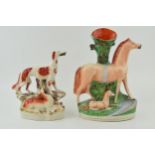 A Victorian Staffordshire Setter and Deer Figure and a Horse spill vase, tallest 30cm tall (2).