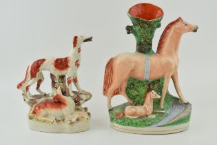 A Victorian Staffordshire Setter and Deer Figure and a Horse spill vase, tallest 30cm tall (2).