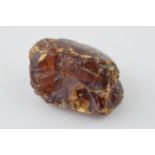 A specimen of raw Amber or similar material. (Weight 20 grams)