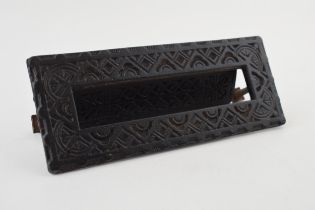 A cast iron letter box with flower motif marked Kenrick & Sons No. 6 to reverse. 19cm.