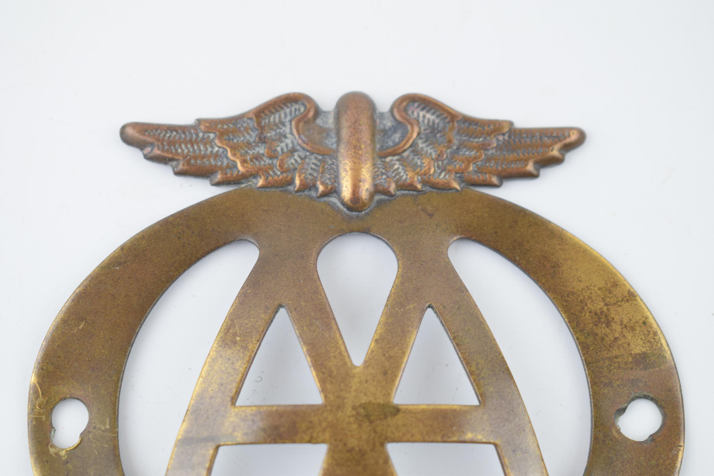 An early example of a brass AA badge No. 5C04518. 11cm. In good original condition with some wear - Image 3 of 4