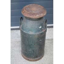 Vintage milk churn 'CWS', 74cm tall, painted green. Holes to bottom.