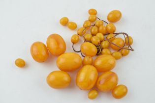 Butterscotch amber similar graduated necklace beads. Weight 84 grams. beads good but a/f have become