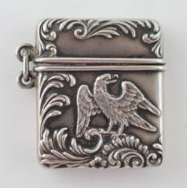 An antique silver Vesta case with bird design marked Sterling. 28mm. In good original condition.