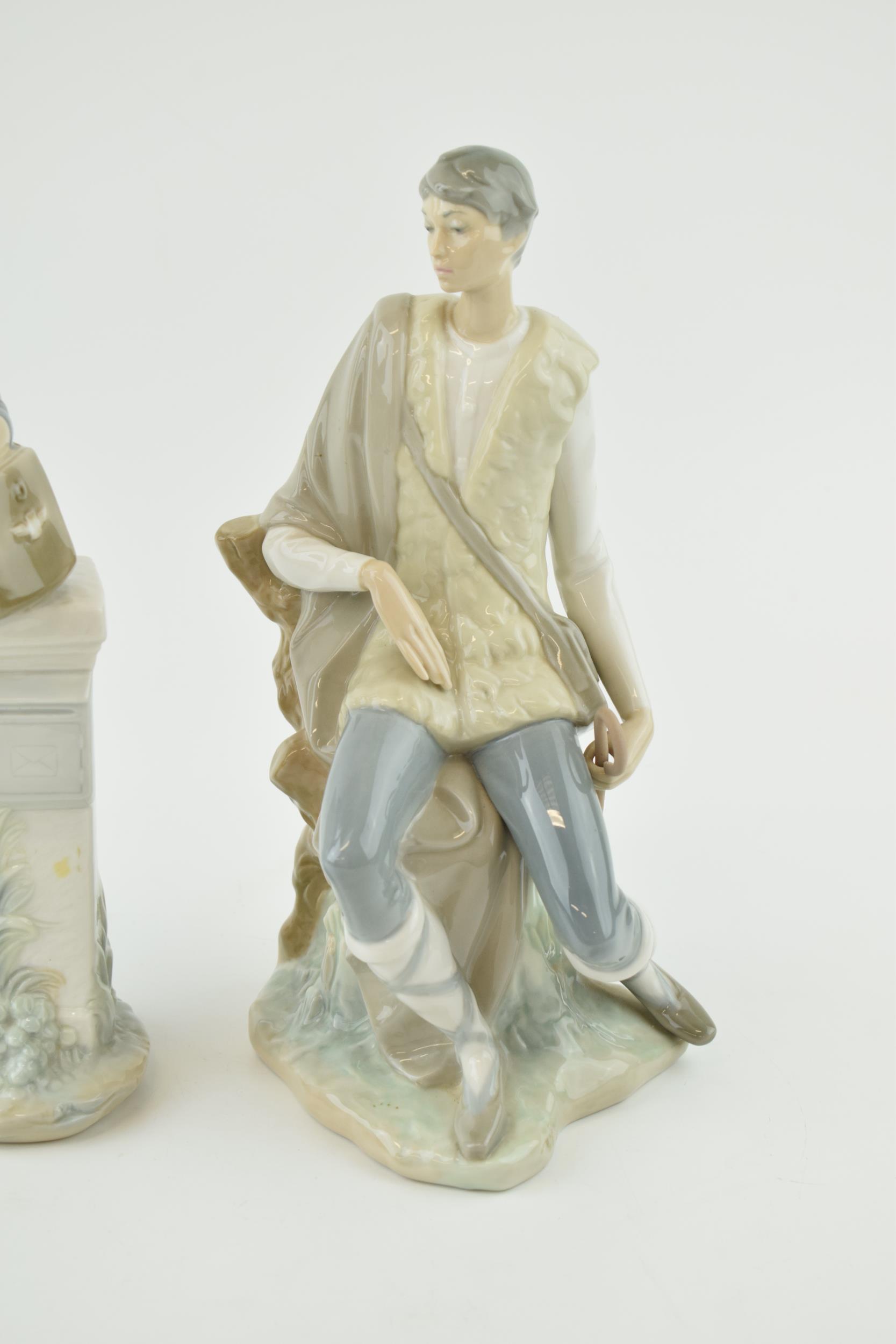 Lladro and Nao figures to include a postman and a hiker (2). In good condition with no obvious - Image 3 of 4