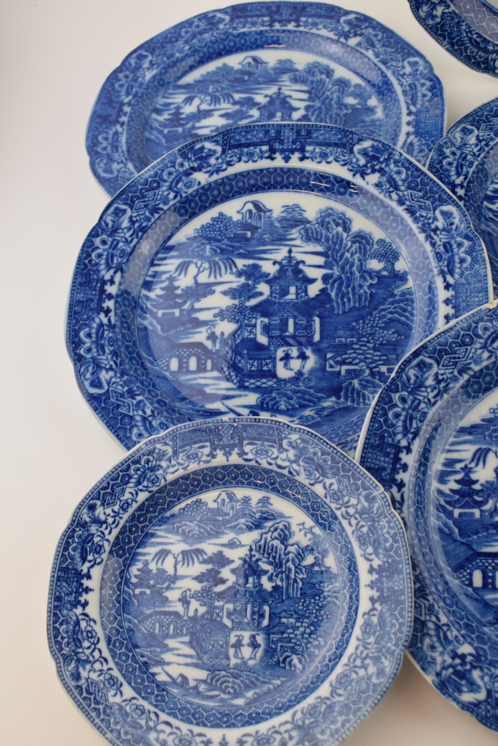 A group of late 18th century pearlware blue and white transfer-printed “Two Figures” pattern - Image 4 of 5
