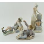 A trio of figures to include a Lladro boy with a bird on his foot (bird glued back), with a pair