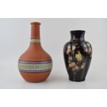 A 19th century terracotta coloured bottle vase, probably Copeland, c. 1870 together with a Bretby