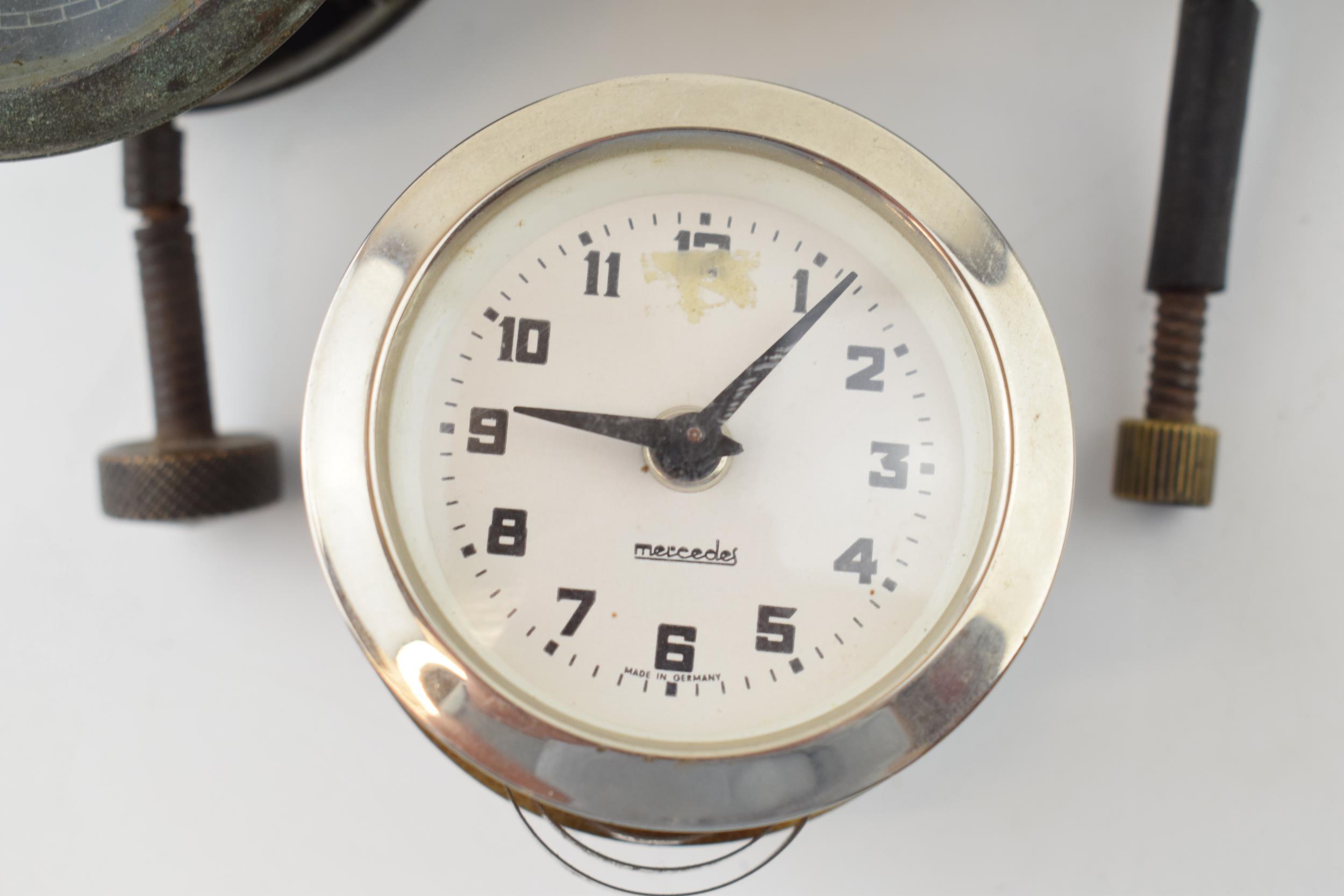 A collection of car clocks to include examples by Smiths, Jaeger and Mercedes. (3) All wind and - Image 2 of 4