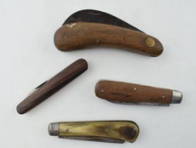 A collection of wooden handled pocket knives to include good examples by Joseph Rodgers, Taylors Eye