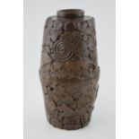 A large and heavy studio pottery vase, in brown colourway, decorated with fish and swirling