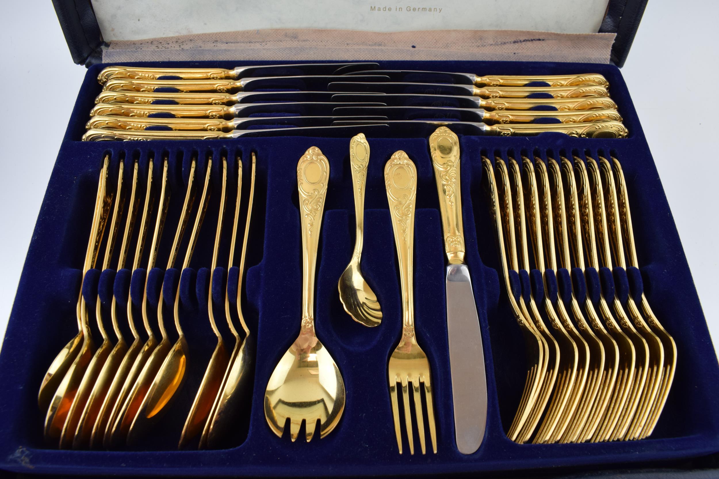 A cased Solingen 24k gold plated cutlery set, in leather brief case, with 3 trays of cutlery, all in - Image 2 of 4