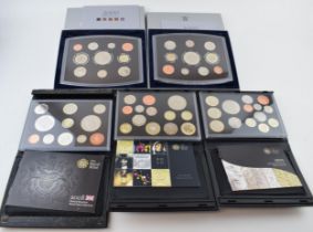 A collection of Royal Mint proof coin sets to include the years 2000 x 2, 2011, 2010 and 2008 (5).