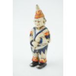 Metal novelty money box in the form of a clown. Height 14cm.