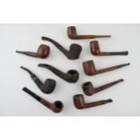 A collection of vintage tobacco smoking pipes to include briar examples by 'Captain Black', '