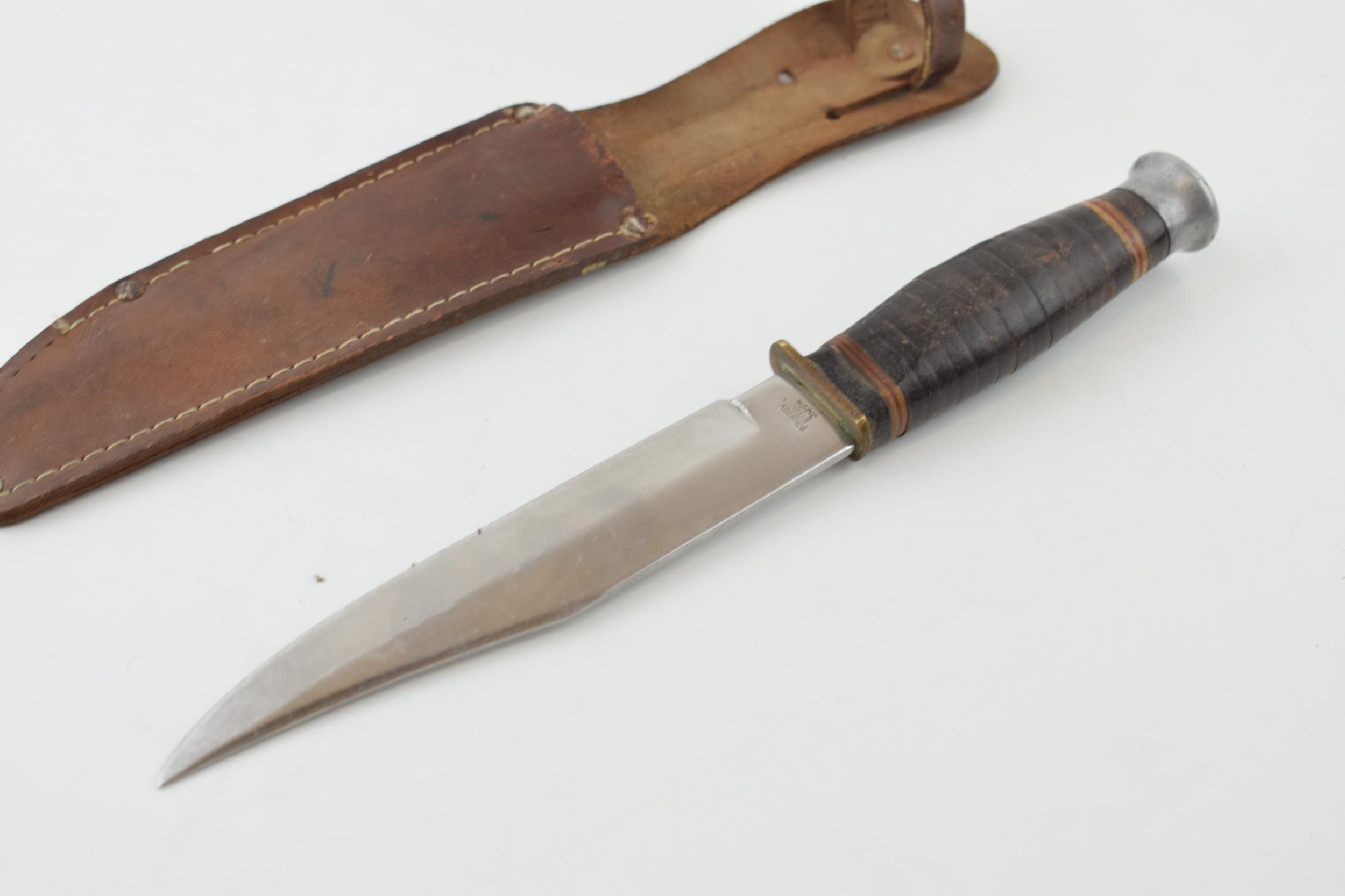 Bowie knife in leather sheath, 'Made in Japan'. Lather handle, 'Stainless Steel Blade', 'Original - Image 3 of 3