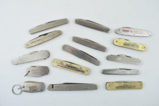 A collection of vintage advertising pocket knives by Sheffield makers including T. Turner, John