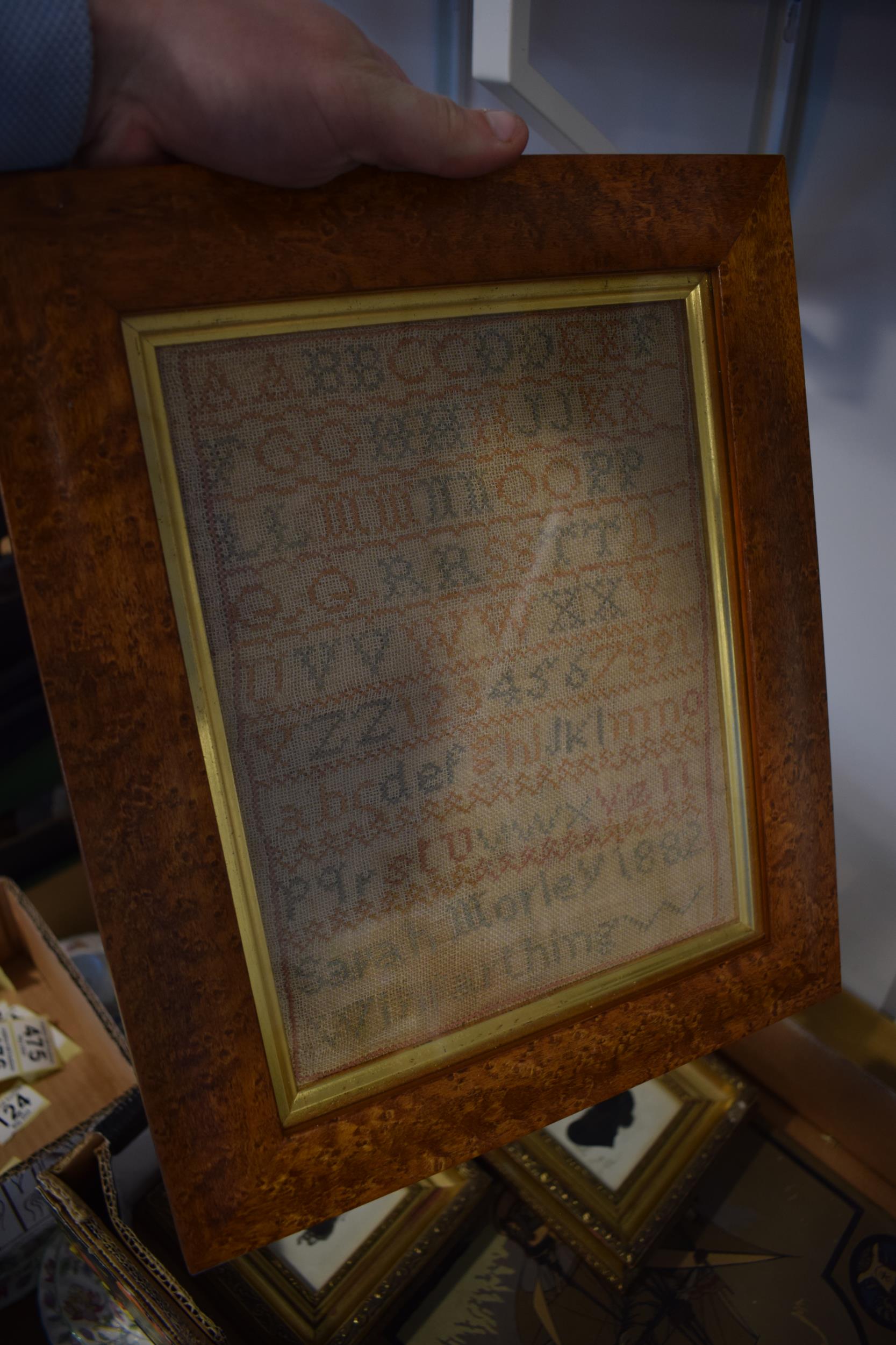 A 19th century sampler dated 1882 together with a pair of silhouettes. Items are in later frames. - Image 2 of 5