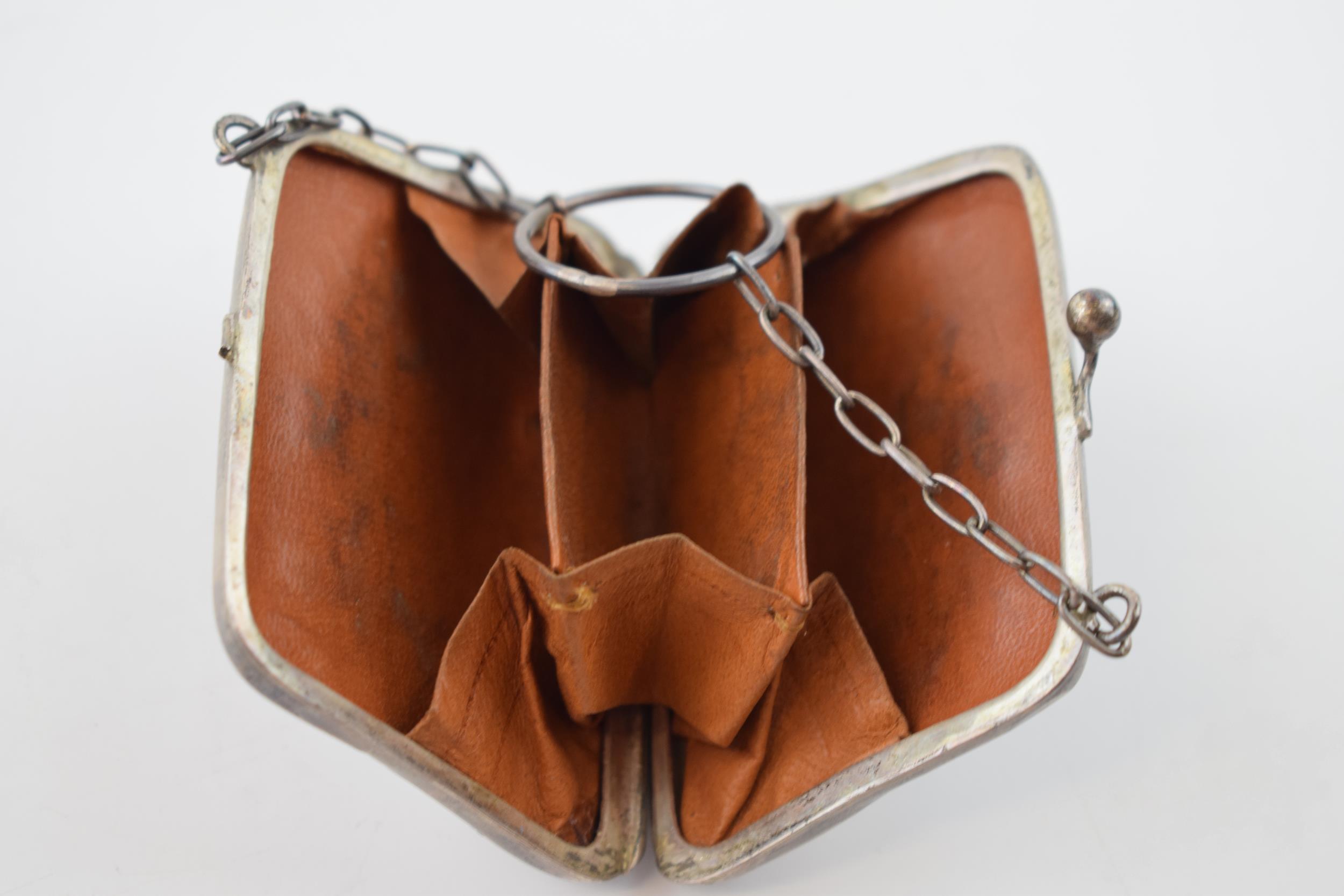 A pair of silver sugar nips, 36.2 grams, with a silver ladies purse with leather insert, gross - Image 4 of 4