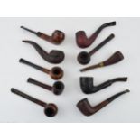 A collection of vintage tobacco smoking pipes to include briar examples by 'Parker', 'Carling', '
