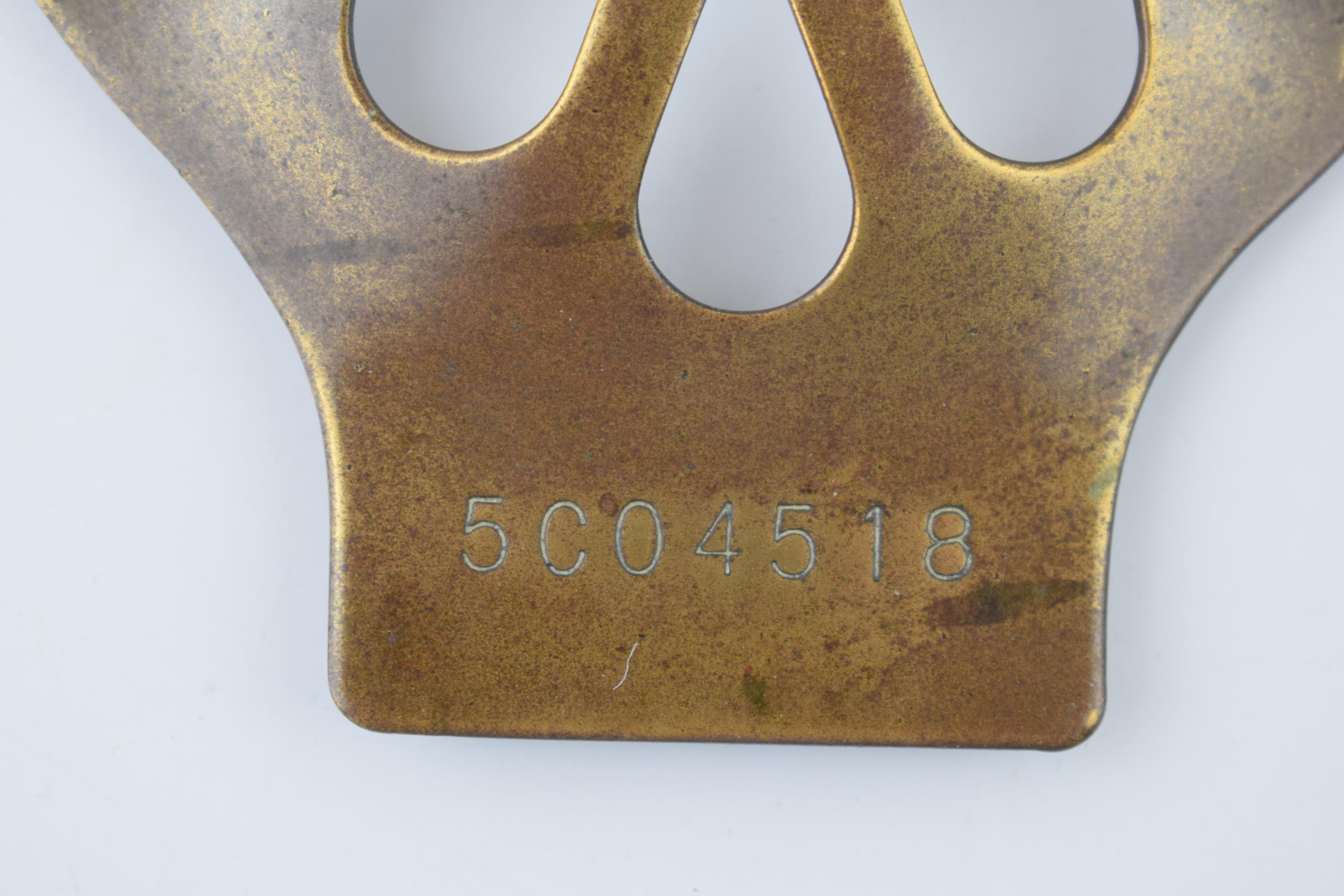 An early example of a brass AA badge No. 5C04518. 11cm. In good original condition with some wear - Image 2 of 4