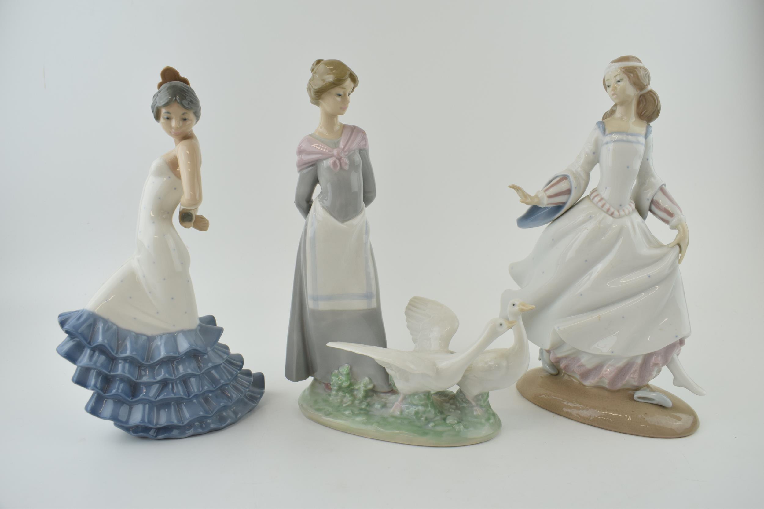 A trio of figures to include a Lladro girl 4820 with a Nao girl with geese and a girl in a frilly