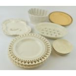 A group of late 18th, early 19th century creamware dessert wares, including pierced plates,