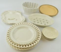 A group of late 18th, early 19th century creamware dessert wares, including pierced plates,