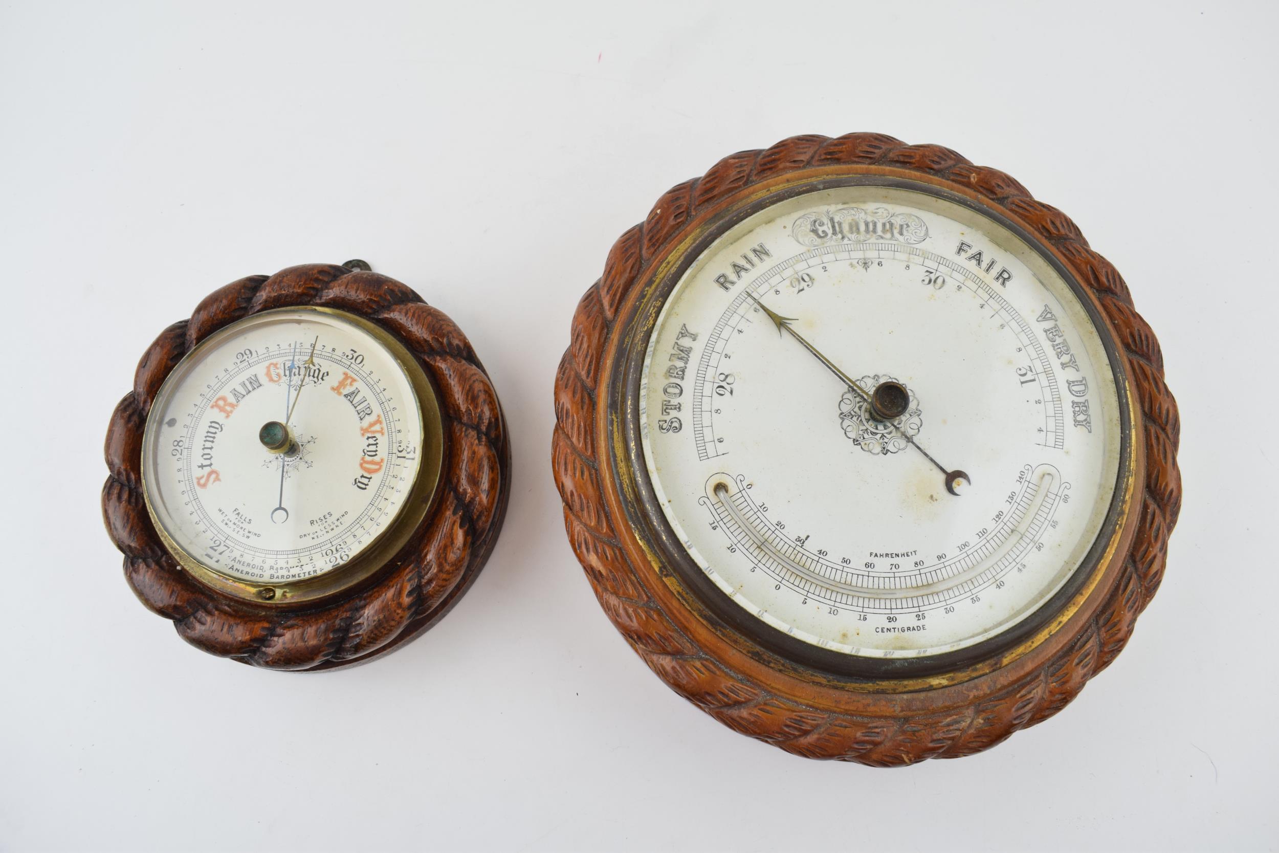 A barometer with intergrated thermometer. Golden oak case. White dial with brass hand. Diameter
