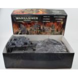 Boxed Warhammer 40,000 Imperial City. Mostly unbuilt with part that is built proffesionally