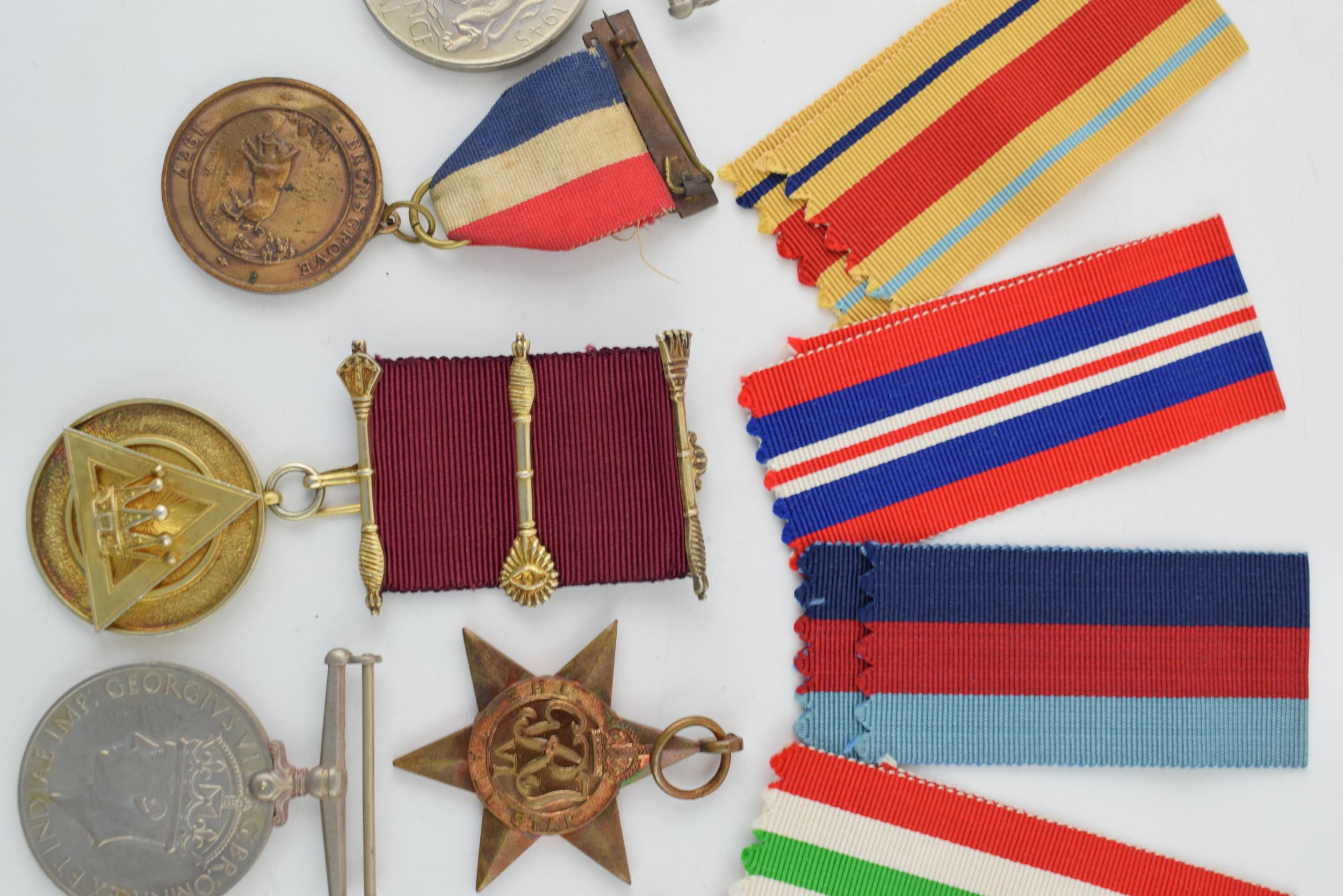 A collection of WWII medals (5) in original paper sleeves together with a silver Masonic medal and a - Image 3 of 4