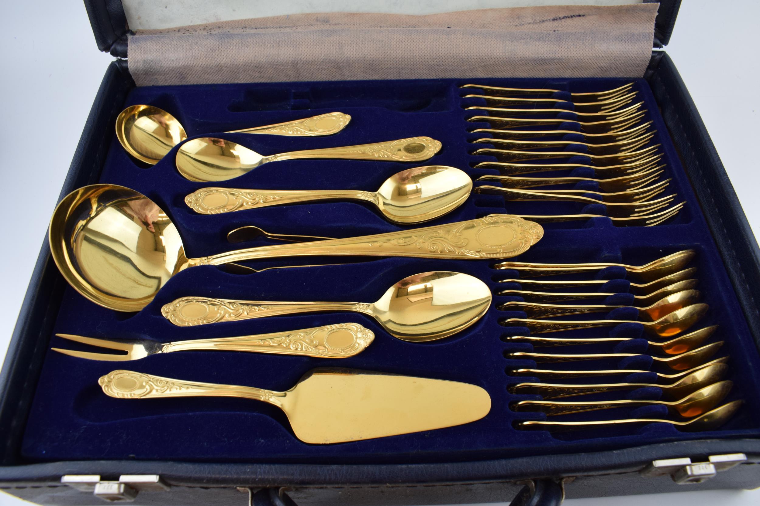 A cased Solingen 24k gold plated cutlery set, in leather brief case, with 3 trays of cutlery, all in - Image 3 of 4