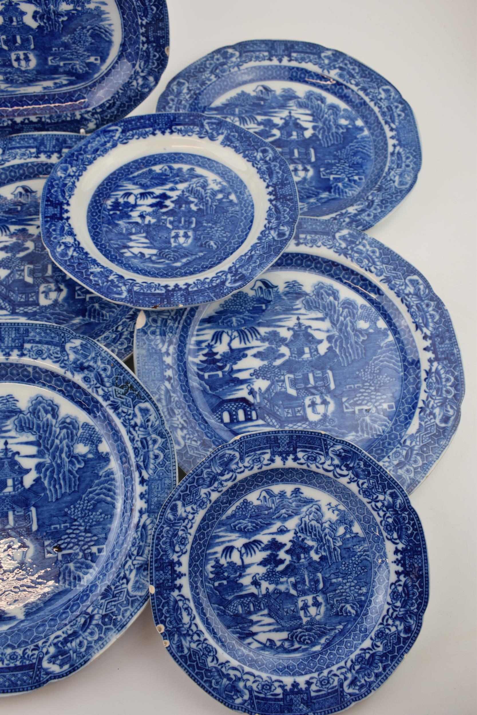 A group of late 18th century pearlware blue and white transfer-printed “Two Figures” pattern - Image 2 of 5