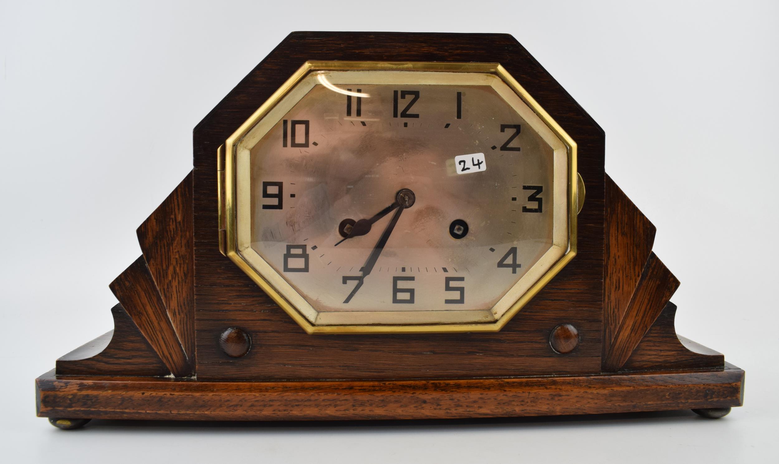 An Art Deco mantle clock with chiming movement. With pendulum and key. Height 20cm. winds, runs - Image 2 of 2