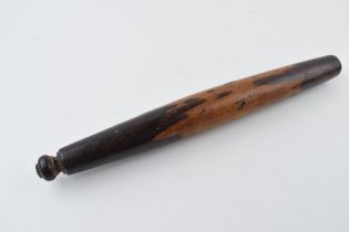 A 19th century pie pin /rolling pin. Lignum vitae or similar hardwood. Of kitchenalia interest.
