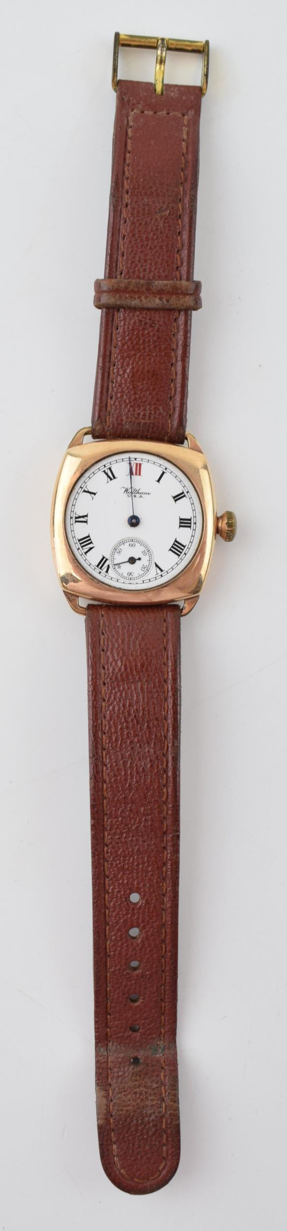 A gold plated gentleman's Waltham U.S.A manual winding wristwatch on brown leather strap. Watch a/f. - Image 2 of 3